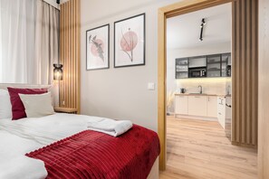 1 habitación, tabla de planchar con plancha, cunas y wifi gratis 