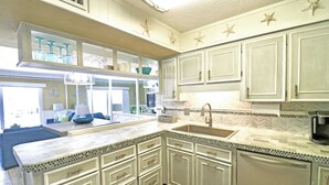 Coffee/tea maker, fridge, microwave, oven