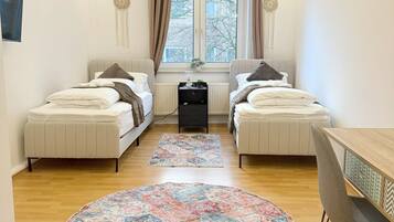 2 bedrooms, desk, iron/ironing board, travel crib