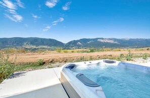 Bañera de hidromasaje al aire libre
