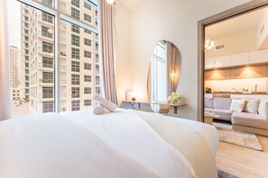 2 chambres, coffres-forts dans les chambres, fer et planche à repasser