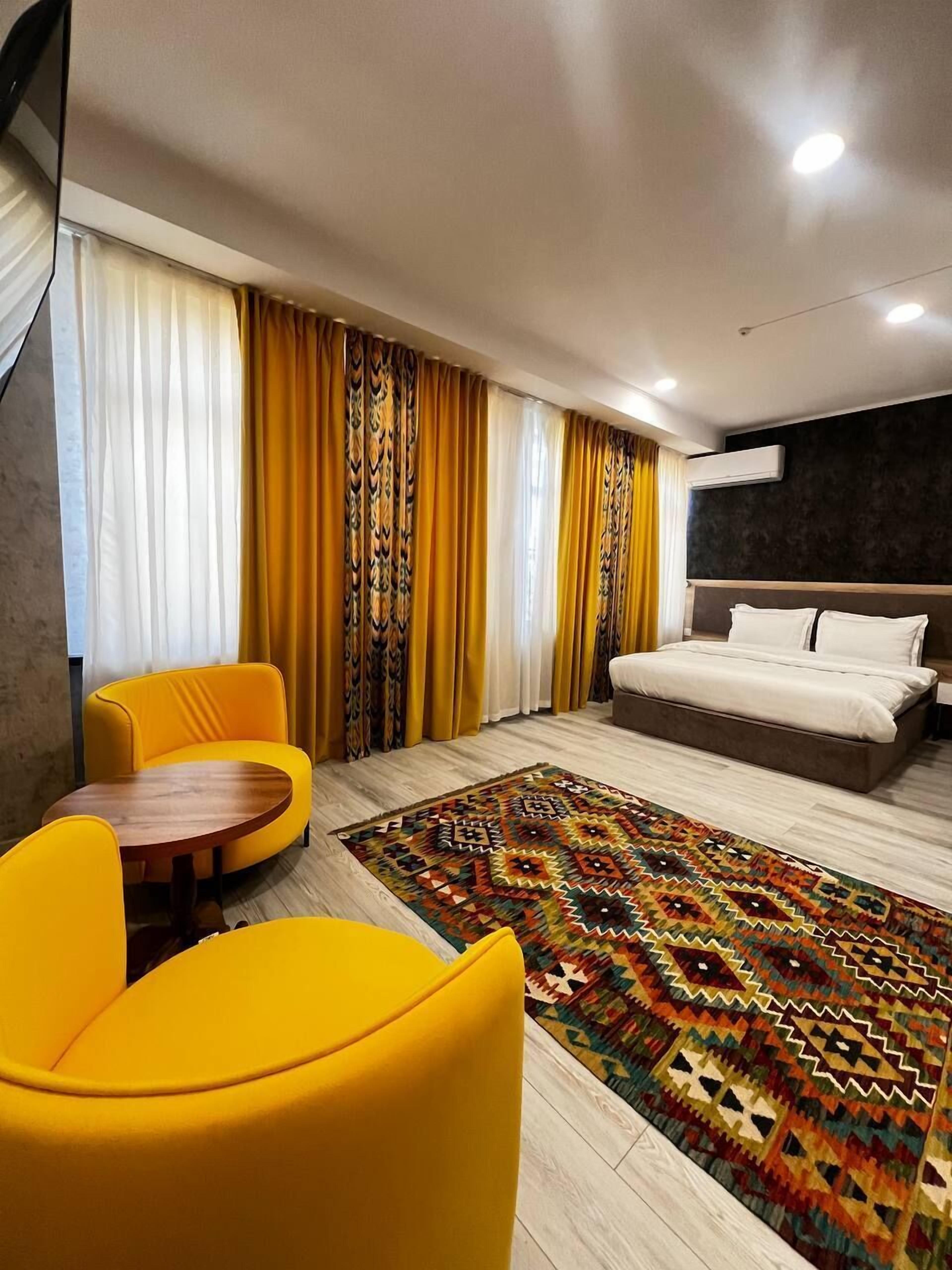 In-room safe, laptop workspace, blackout drapes, soundproofing