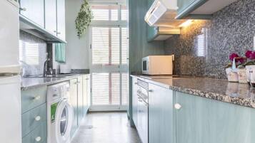 Maison, 4 chambres | Cuisine privée