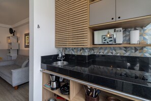 Fridge, microwave, coffee/tea maker, toaster