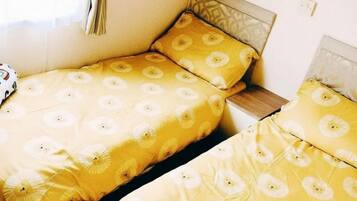 2 kamar tidur, setrika/meja setrika, Wi-Fi gratis, dan seprai linen