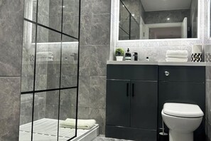 Hair dryer, towels, soap, shampoo