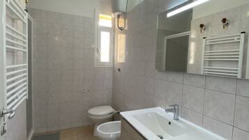 Chuveiro, secador de cabelo