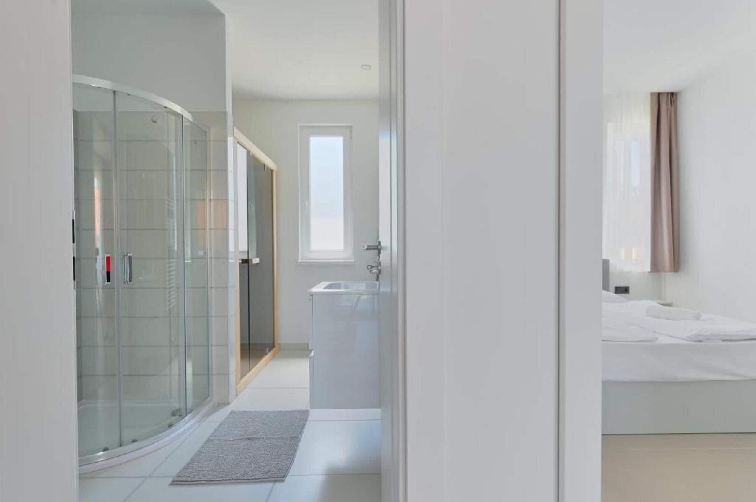 Shower, towels, soap, toilet paper