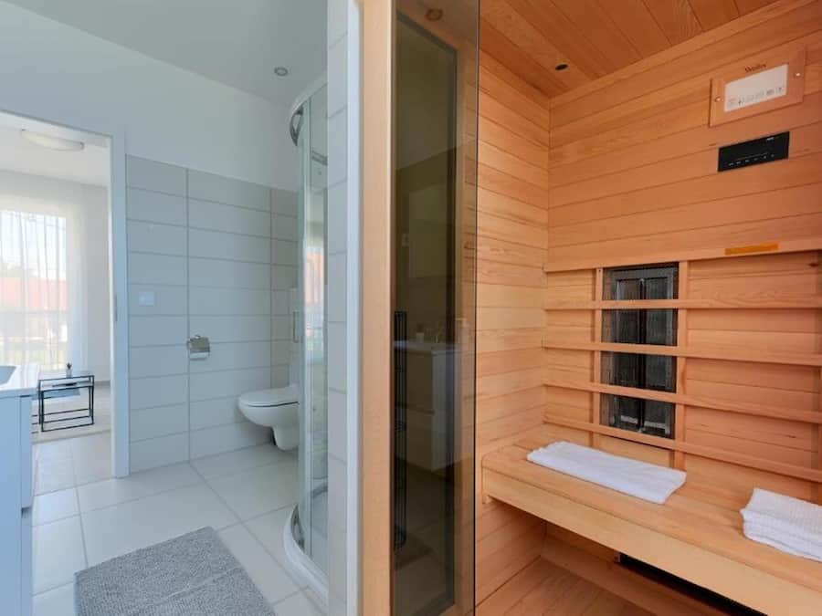 Shower, towels, soap, toilet paper