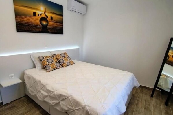 2 quartos, ferros/tábuas de passar roupa, Wi-Fi, roupa de cama