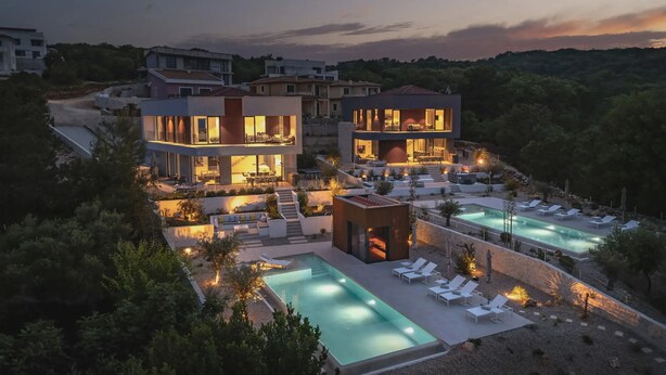 A modern villa with a swimming pool, outdoor seating, and a well-lit terrace. - Villa Moana on Krk - Crovillas (Vrbnik)