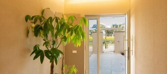 Air-conditioned apartment in greenery in a structure  swimming pool and E-bike
