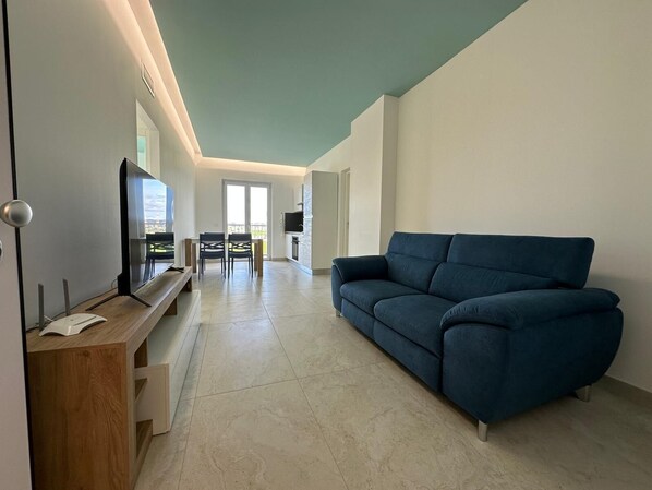 Living area - Air-conditioned apartment in greenery in a structure swimming pool and E-bike (Lazio)