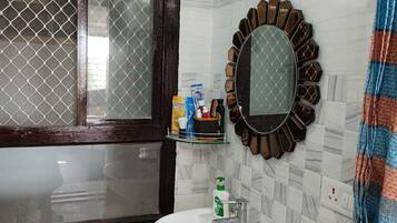 Shower, towels, soap, shampoo