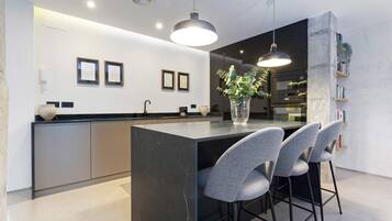 Microwave, dishwasher, toaster, dining tables