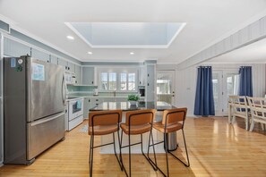 Fridge, microwave, oven, stovetop - Sunset Beach 3BR Cottage with Spacious Deck & Screened Porches (Sunset Beach)