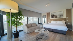 In-room safe, desk, laptop workspace, soundproofing - Spot Suites (Santiago)