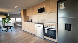 Superior Apartment, 1 King Bed with Sofa bed, Balcony | Private kitchen | Fridge, microwave, oven, stovetop