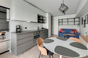 Classic Apartment, Courtyard View | Private kitchenette | Full-size fridge, oven, stovetop, cookware/dishes/utensils