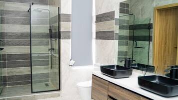 Economy Apartment, Balcony, City View | Bathroom | Free toiletries, hair dryer, towels, soap