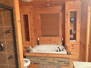 Jetted tub, hair dryer, towels, soap