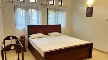Quarto quádruplo família, vista para o jardim | Wi-Fi de cortesia
