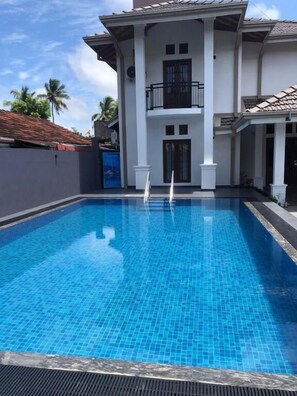 Habitación cuádruple familiar, vistas al jardín | Vistas del balcón