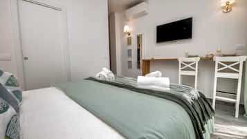 1 habitación, tabla de planchar con plancha, wifi y ropa de cama