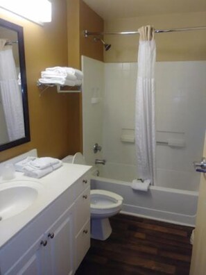 Shower, towels, soap, toilet paper