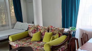 Classic Studio, City View | Living area | 24-inch Smart TV with digital channels