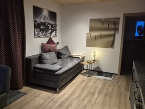 Comfort Condo, 2 Bedrooms, Balcony, Mountain View | Living area | Flat-screen TV