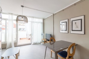 Penthouse, City View | Living area | 40-inch TV with digital channels - BeBarceloner Sant Andreu Apartments (Barcelona)