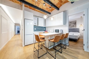 Family Apartment, City View | Private kitchen | Microwave, oven, stovetop, coffee/tea maker - BeBarceloner Eixample Apartments (Barcelona)