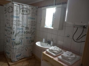 Hair dryer, towels, soap, shampoo