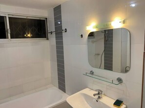 Shower, hair dryer, towels, soap