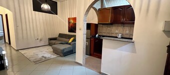 Kinaxixi Palace in Largo rehabilitated. Spacious apartment with balcony.