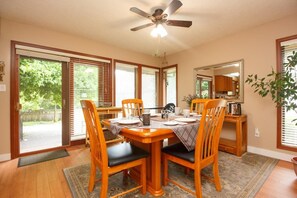 Cottage, Multiple Beds, Fireplace, Garden View (Petie's Cottage) | Dining - Cole's Bay Vacation Retreat Petie's Cottage (Sidney)