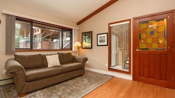 Cottage, Multiple Beds, Fireplace, Garden View (Petie's Cottage) | Living area | TV, fireplace