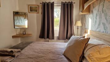 2 dormitorios, tabla de planchar con plancha, wifi gratis y ropa de cama