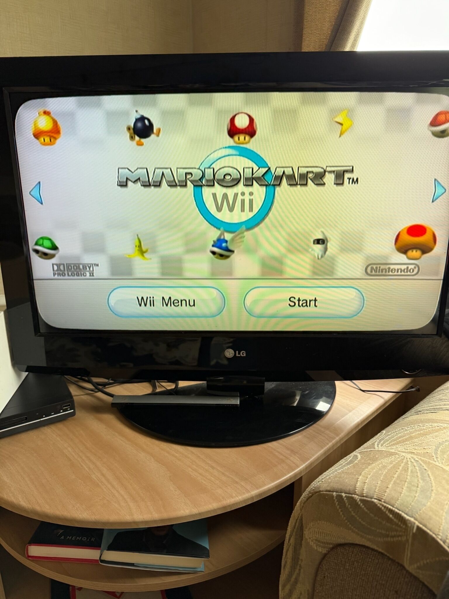 A television displaying the Mario Kart Wii game menu on an LG TV.