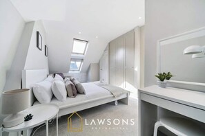 4 bedrooms, iron/ironing board, travel cot, WiFi