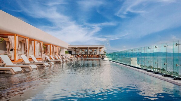 3 outdoor pools, pool umbrellas