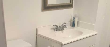 Hair dryer, towels, soap, shampoo