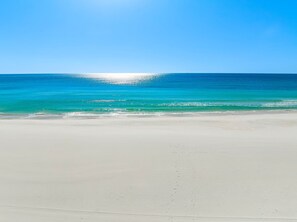 On the beach, sun-loungers, beach towels