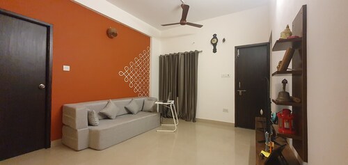 Convenient shared room in a 2bhk with all amenities at value in central Chennai.