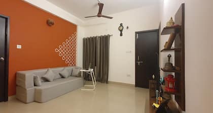 Convenient shared room in a 2bhk with all amenities at value in central Chennai.