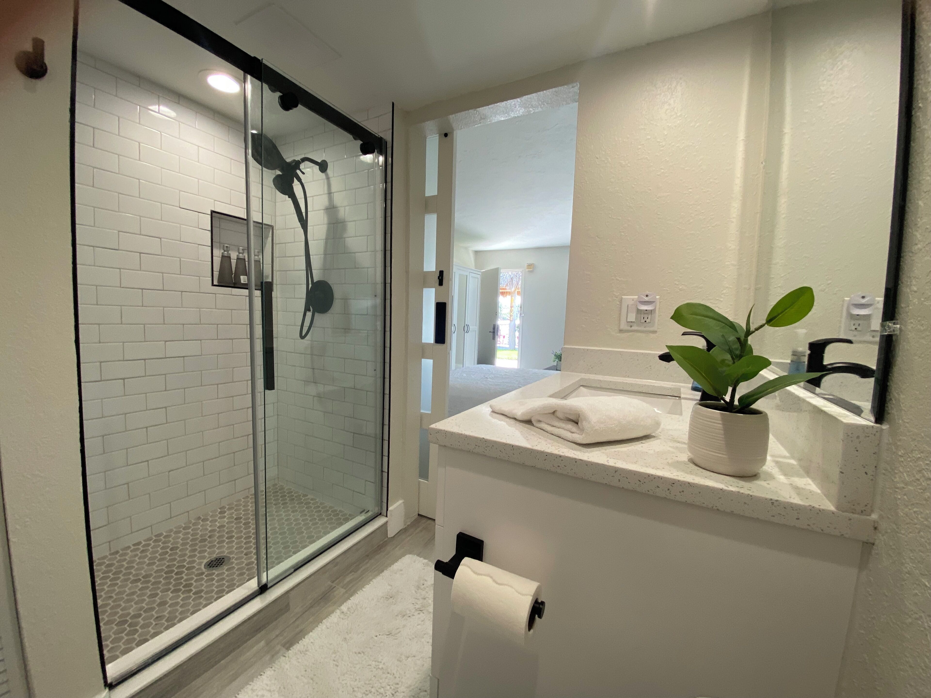 Shower, hair dryer, towels, soap
