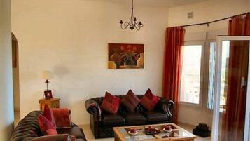 Villa | Living area | Fireplace
