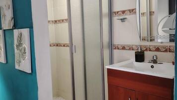 Bidet, towels, soap, shampoo