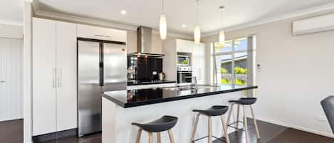 Coffee/tea maker, fridge, microwave, oven